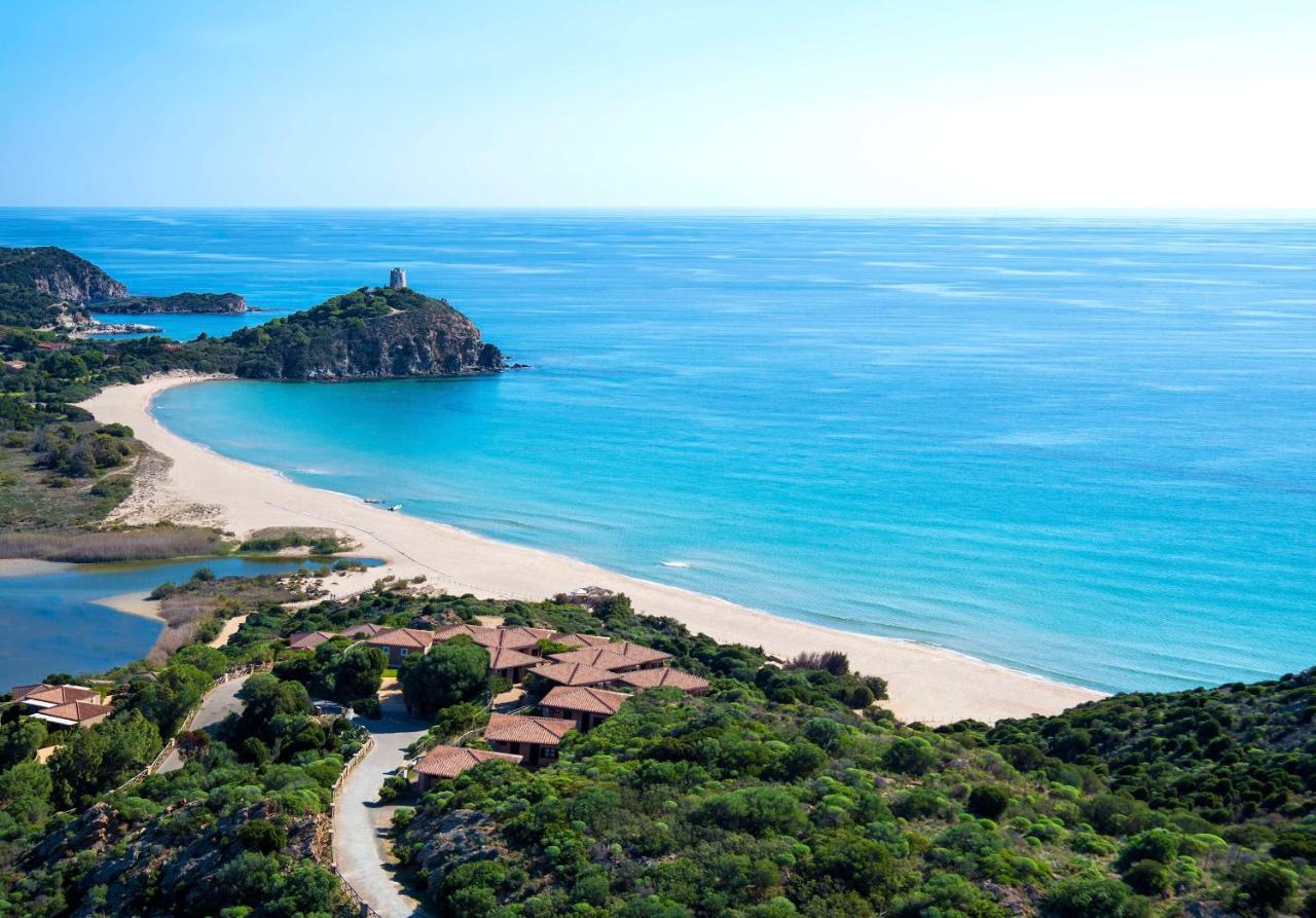 Baia Di Chia Resort Sardinia, Curio Collection By Hilton 外观 照片